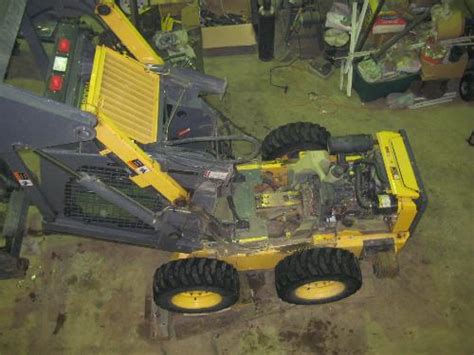 new holland skid steer tilting instructions